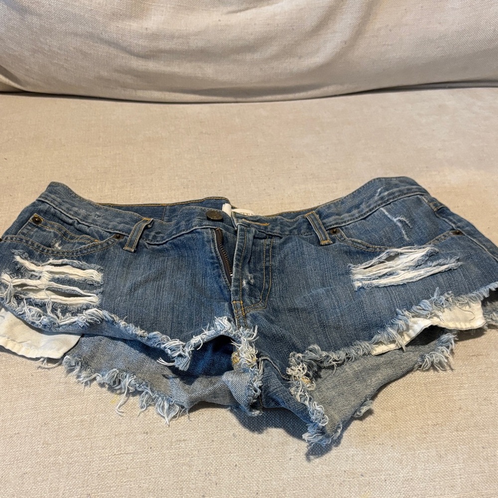 Kittenish Blue Distressed Jean Shorts